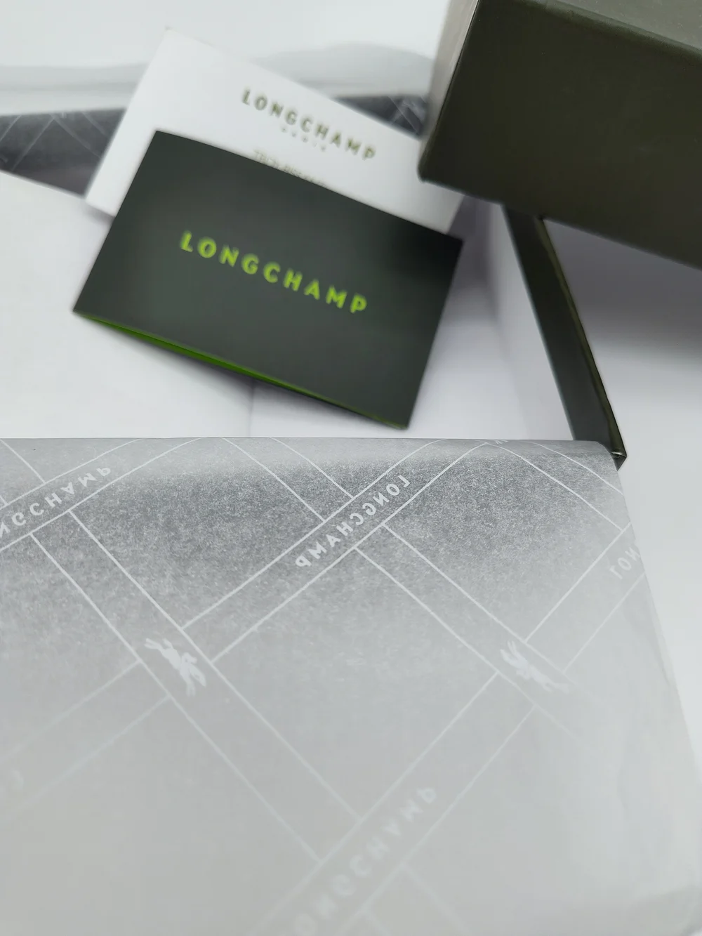 Longchamp includes signature